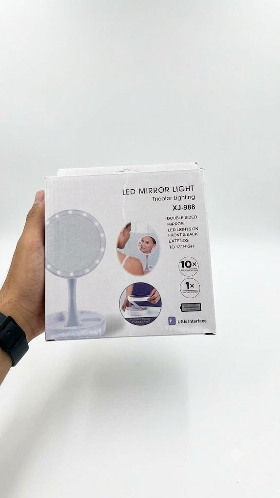 Un miroir de maquillage lumineux double face